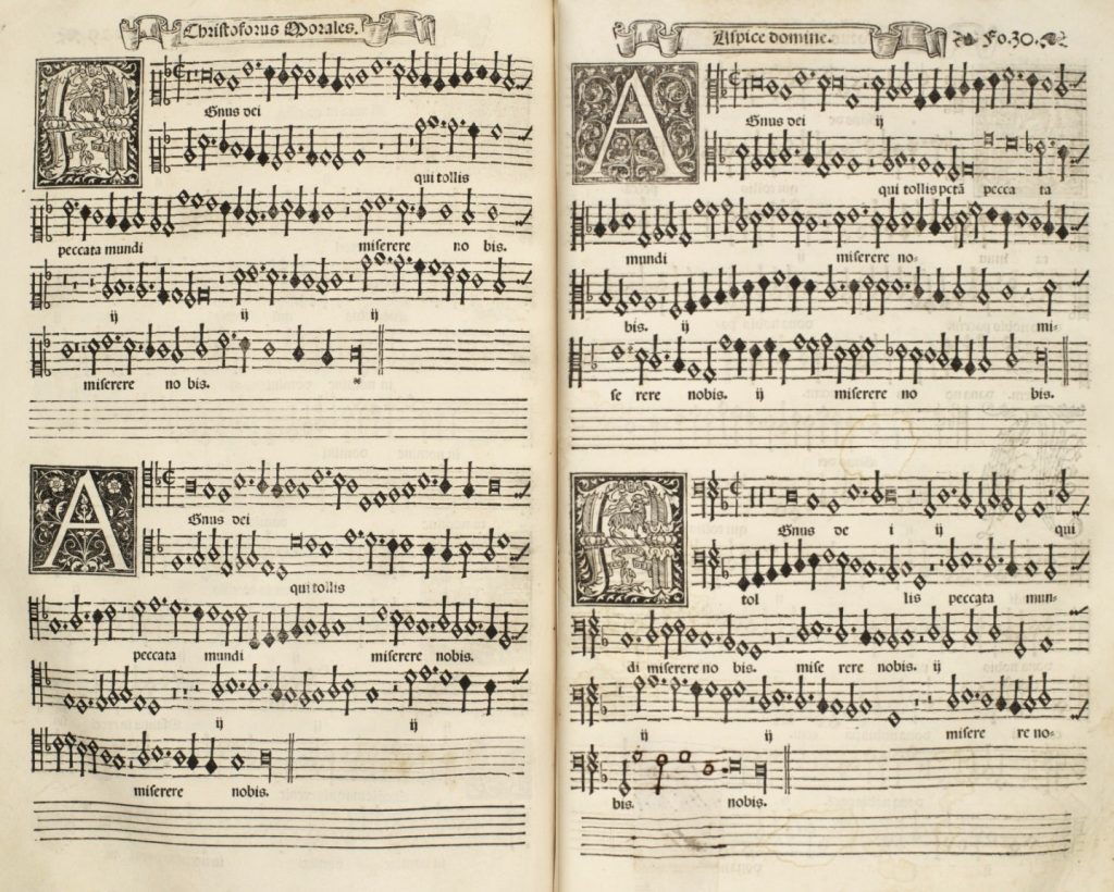 Agnus 1, from Morales’s Missa Aspice domine. Each page features an illuminated A, depicting a lamb and cross in the center, as well as two less decorative letter A's, each surrounded with a decorative floral design.